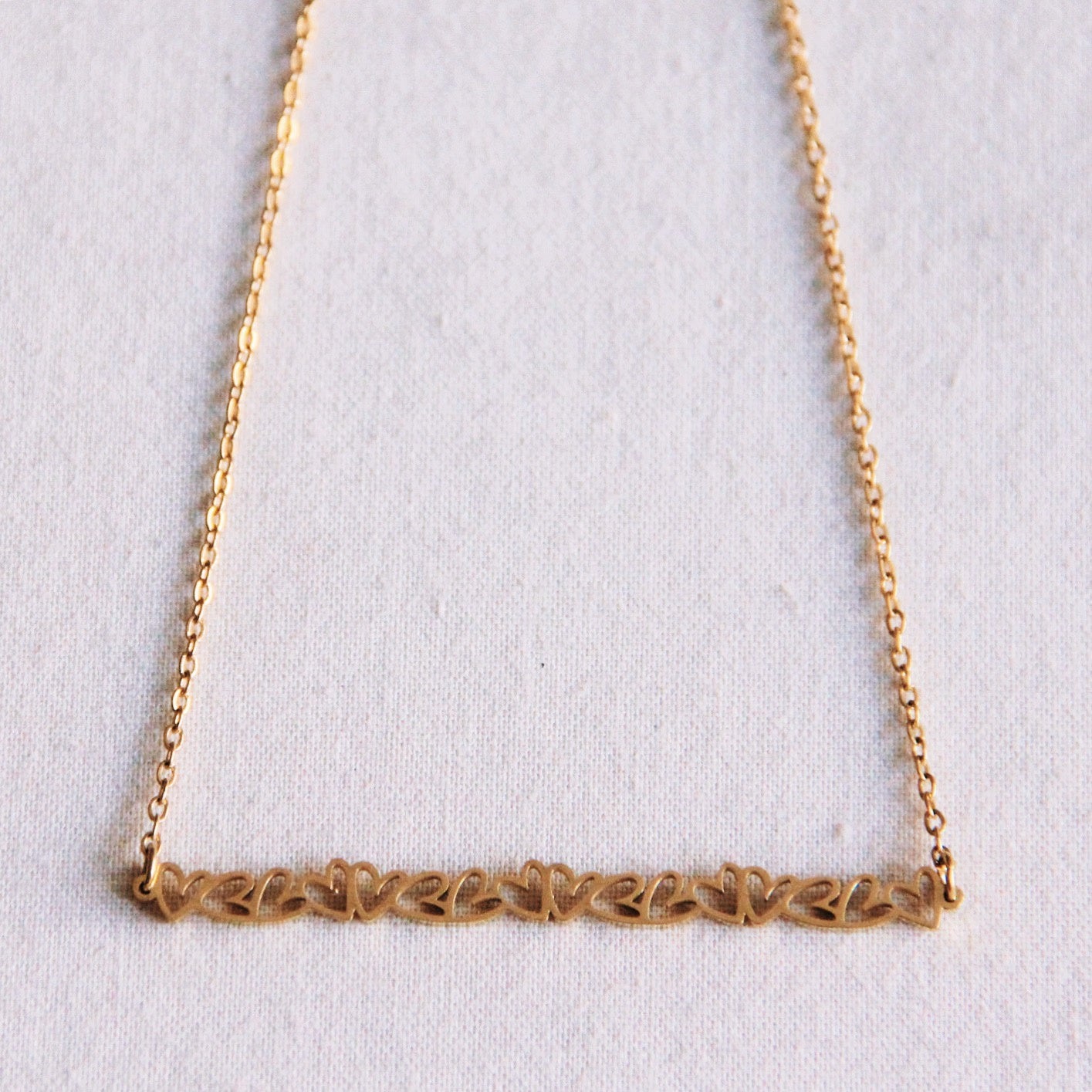Bazou Fine Chain Row of Mini Hearts Necklace