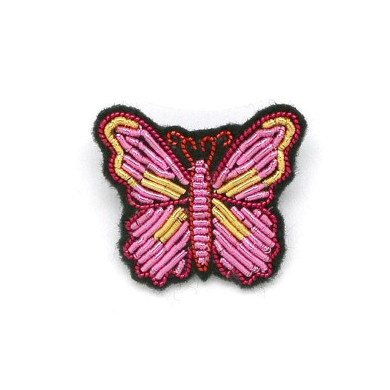 Butterfly-shaped patch with pink and yellow design on a white background, featuring mooncc and HABAHA logos.