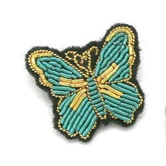 Two butterfly-shaped embroidered patches on a white background with 'mooncc' and 'Habana' logos.