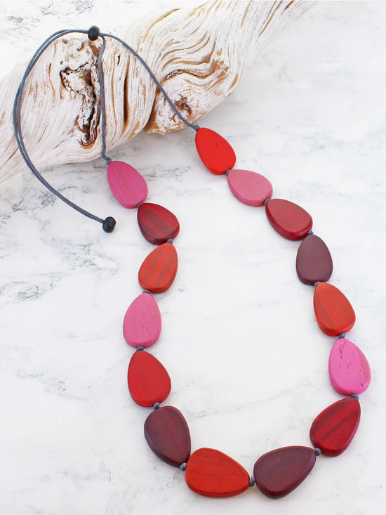 Suzie Blue Long Wooden Pebble Necklace