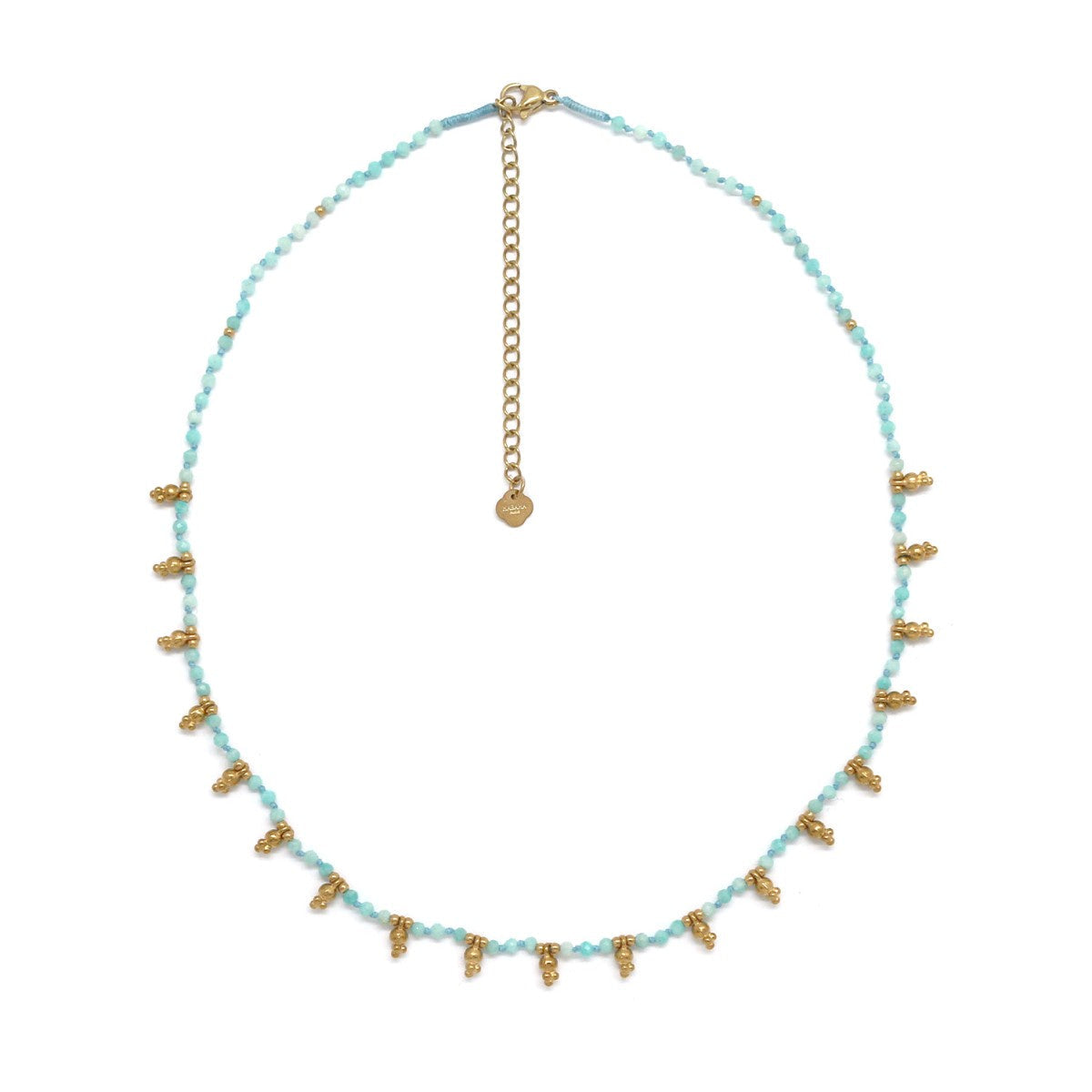 Necklace with blue beads and gold accents on a white background