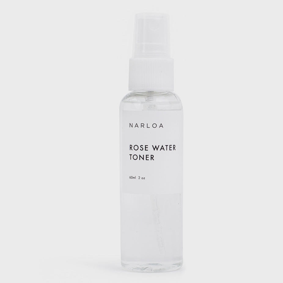 Clear bottle of Narloa Rose Water Toner on a white background