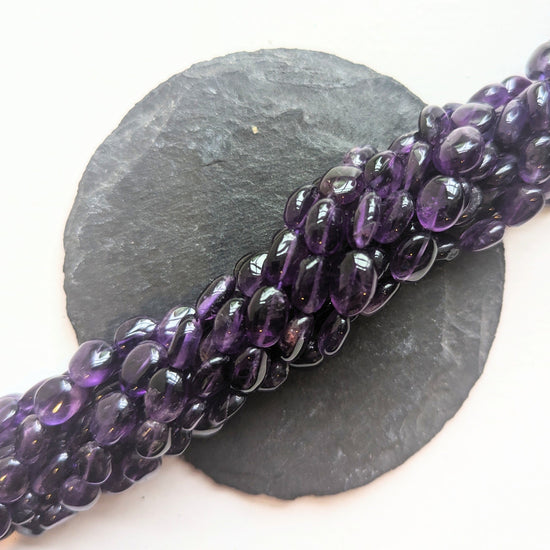 precious sparkle African Amethyst Oval Beads 15" Strand